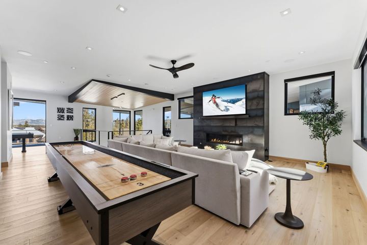 Game lounge with shuffleboard and lounge seating